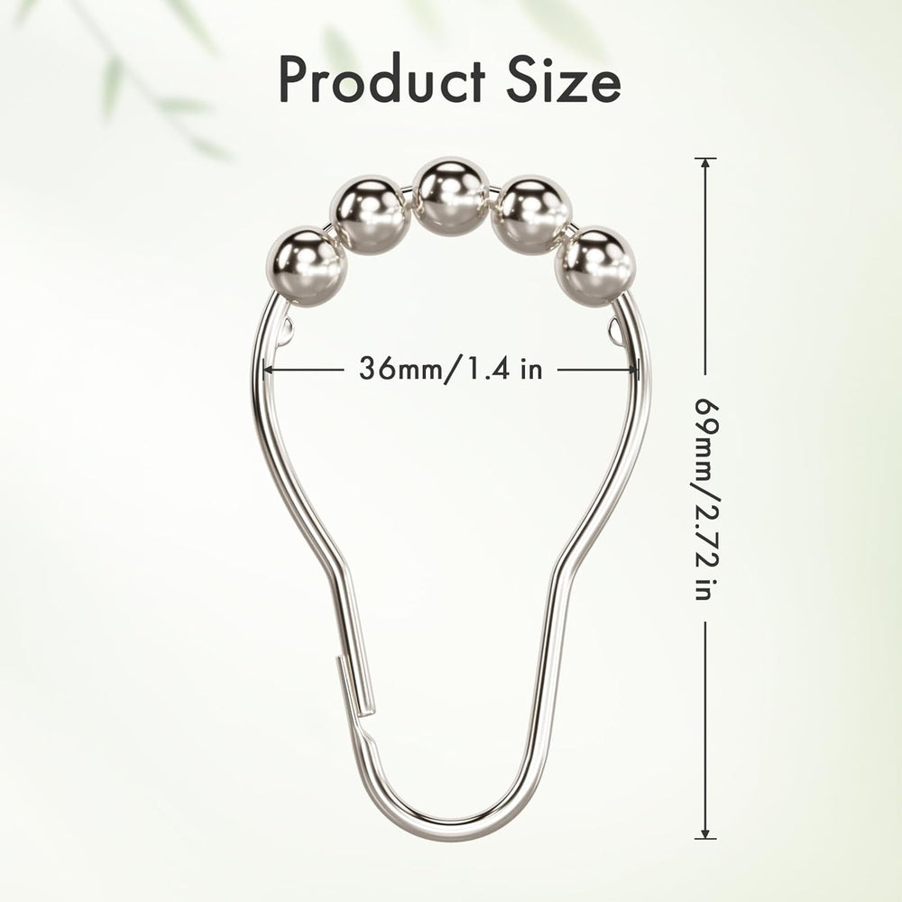 Silver safety pin with beads and measurements on a white background