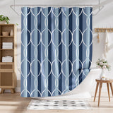 Blue and white patterned shower curtain in a bathroom setting