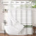 Striped shower curtain with tassels in a bathroom setting