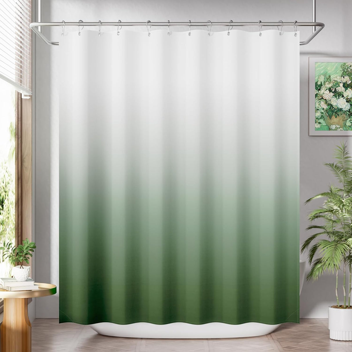 Green and white gradient shower curtain in a bathroom setting with plants and a table.