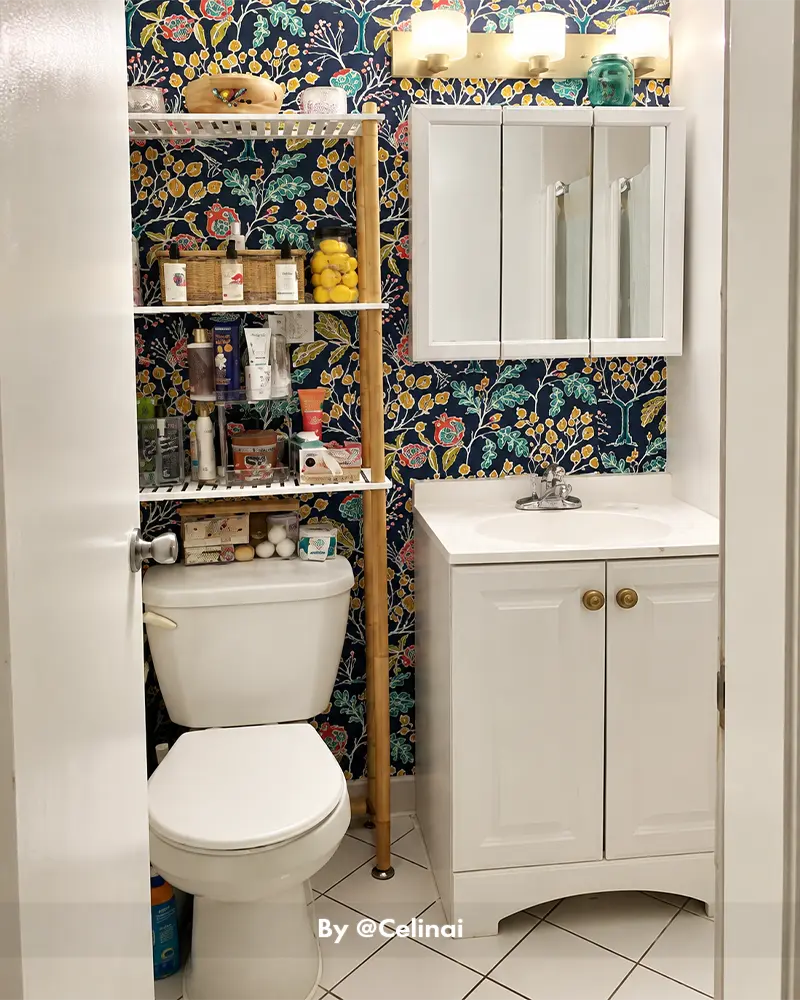 AmazerBath space-saving bamboo rack installed above a toilet, adding open storage for towels, toiletries, and bathroom decor