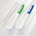 Two cleaning brushes with green and blue handles on a white background