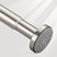 Close-up of a stainless steel shower rod with a textured end cap on a light gray background