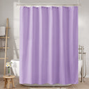 Purple shower curtain in a bathroom setting with a bathtub and towel rack.