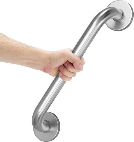 Hand holding a stainless steel grab bar against a white background