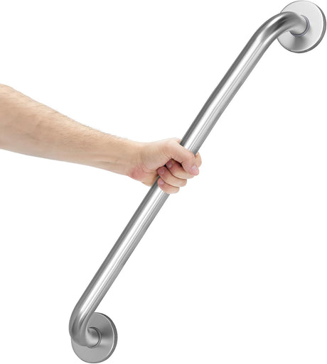 Hand holding a stainless steel grab bar against a white background