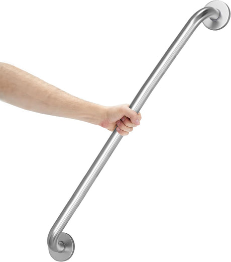 Hand holding a stainless steel grab bar against a white background
