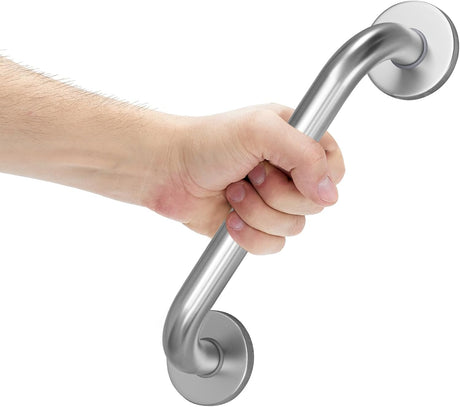 Hand holding a stainless steel grab bar against a white background