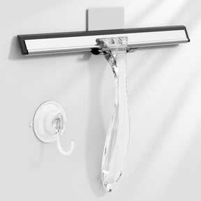 Clear squeegee with black handle on a white background
