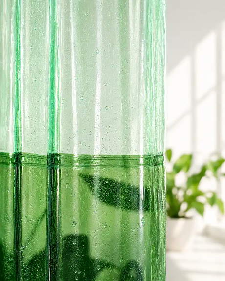 AmazerBath green transparent shower curtain liner with water droplets glowing in natural sunlight