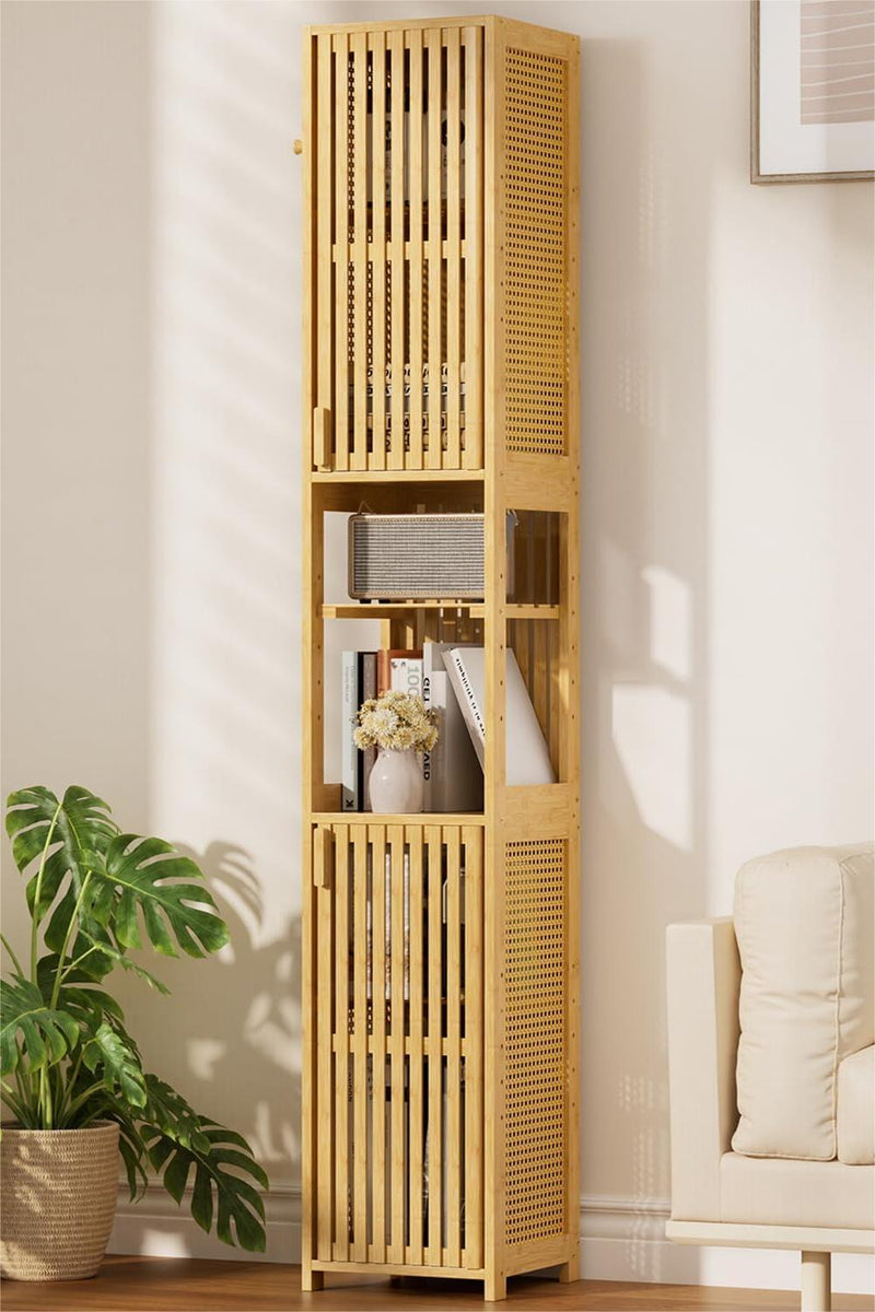 Tall bamboo wooden bookshelf with decorative items against a light wall.