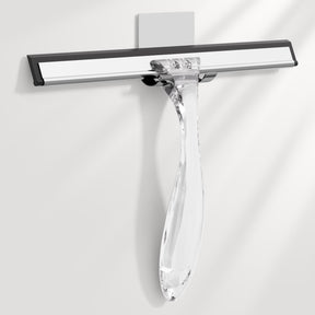 Clear glass squeegee with black rubber blade on a white background