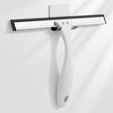 Window cleaning squeegee with white handle and black rubber blade on a light gray background