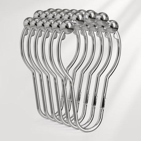 Set of metal hangers on a light gray background