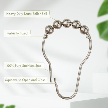 Heavy-duty brass roller ball shower curtain hook with text labels on a light background