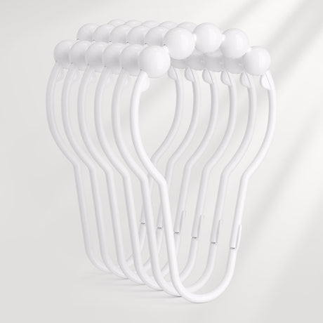 Set of white hangers on a light gray background
