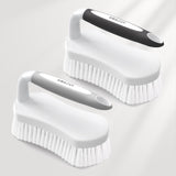 Two white cleaning brushes with black handles on a light gray background, branded 'Amazer'.
