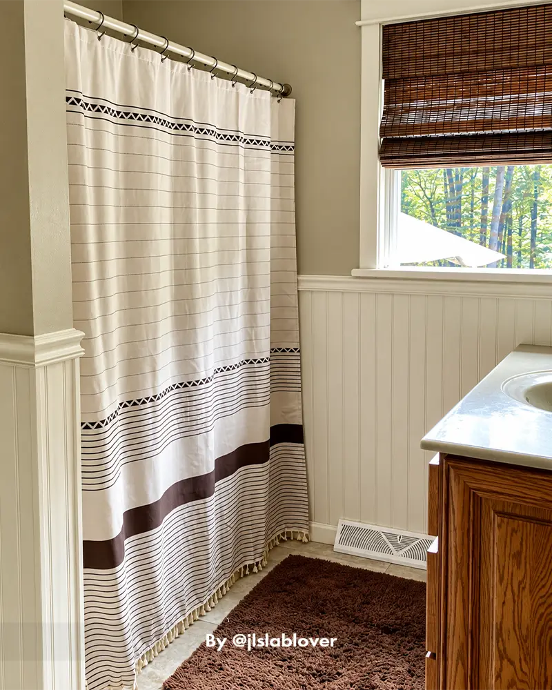 AmazerBath textured stripe boho shower curtain styled in a real home bathroom with a clean, relaxed decorative look