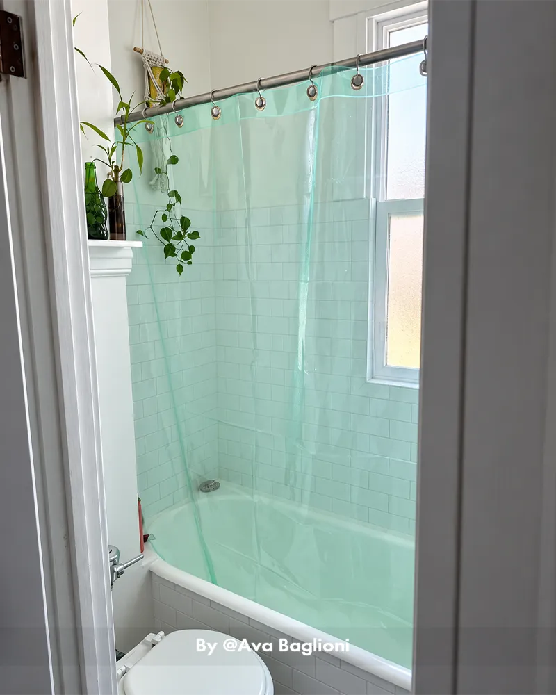 AmazerBath Sun EVA shower liner displayed in a customer bathroom with a clean surface and full bathtub splash protection