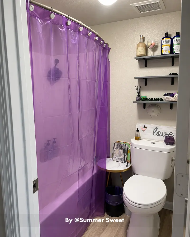 AmazerBath Sun EVA bath liner hanging neatly in a real bathroom, providing water-resistant coverage for the shower area