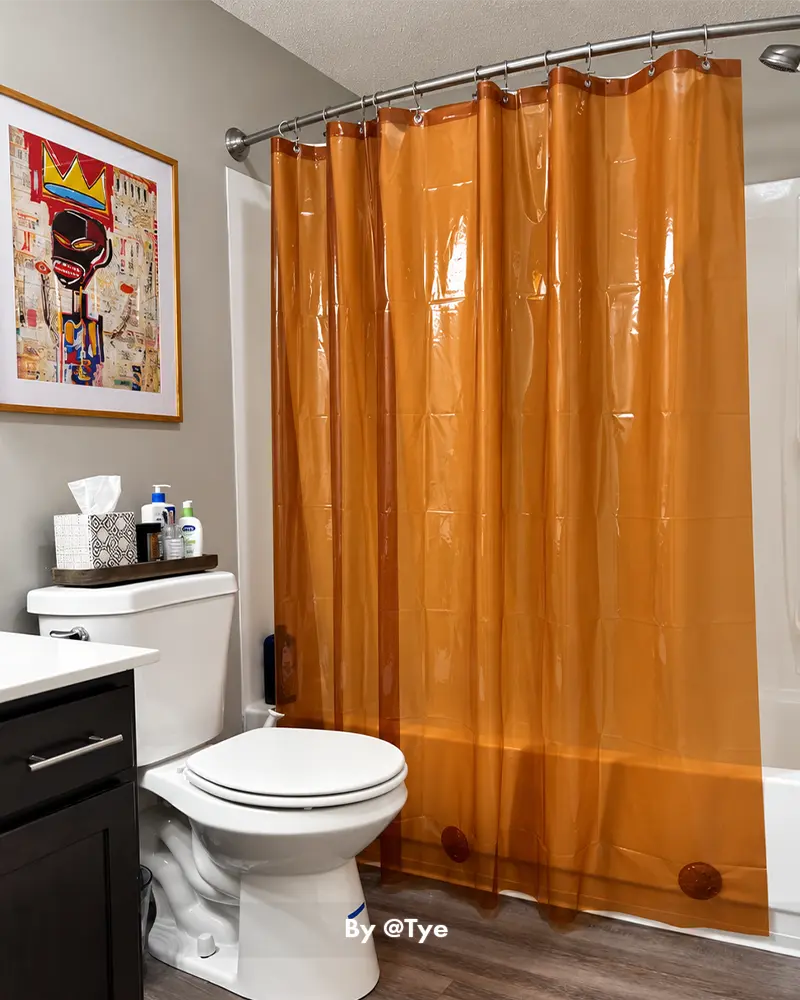 AmazerBath Sun EVA shower curtain liner shown in an everyday bathroom, with smooth hanging coverage inside the bathtub