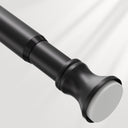 AmazerBath black spring tension shower curtain rod with a white non-slip end cap on a clean gray background.