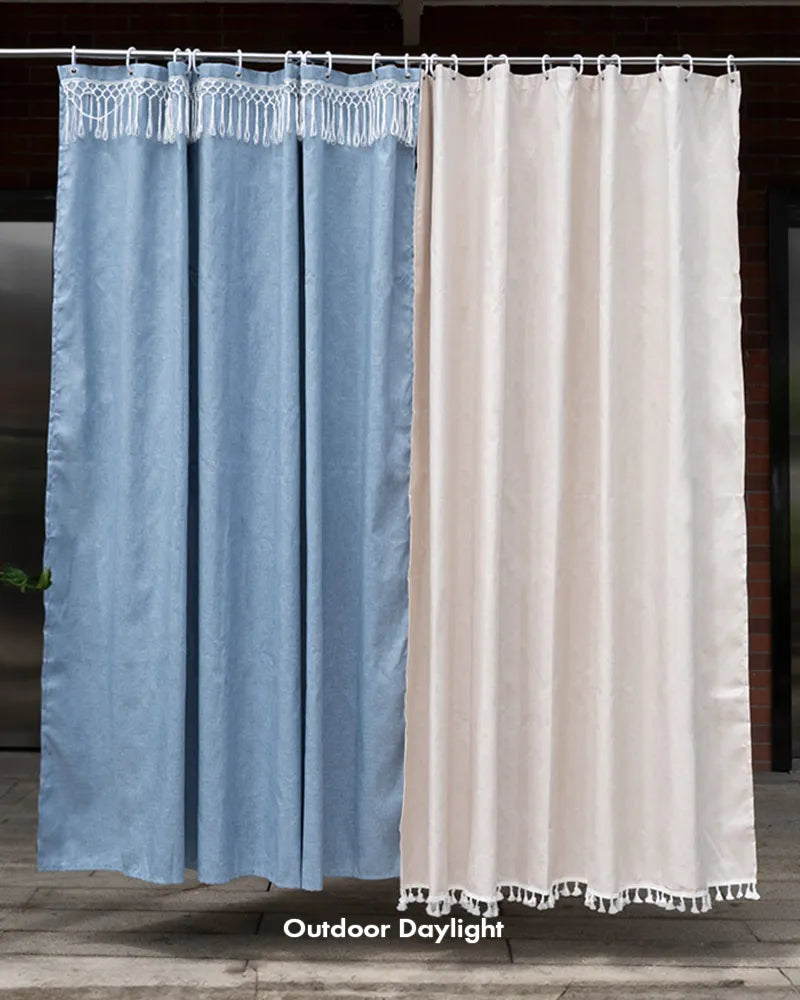 AmazerBath blue and white top tassel shower curtains shown outdoors in daylight to compare color and drape.