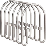 Set of silver shower curtain hooks on a white background