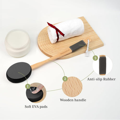 AmazerBath black back lotion applicator with a soft EVA pad, wooden handle, and anti-slip rubber grip.