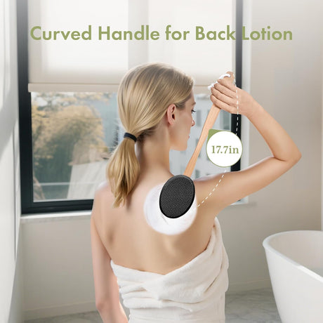 AmazerBath black back lotion applicator used to apply lotion to the upper back.