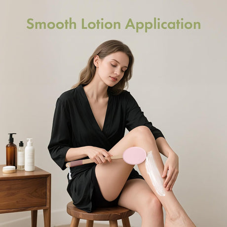 AmazerBath pink back lotion applicator with two replaceable textured EVA pads.