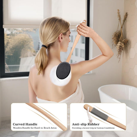 AmazerBath black back lotion applicator used on the upper back with a curved wooden handle and anti-slip grip.