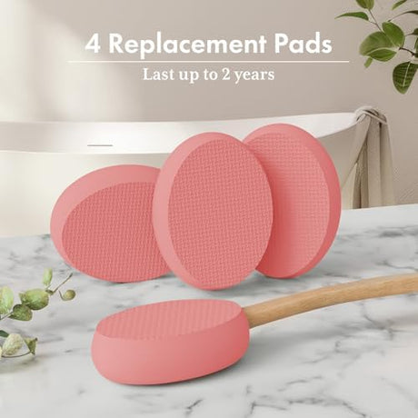 AmazerBath blush pink back lotion applicator with four replaceable textured EVA pads.
