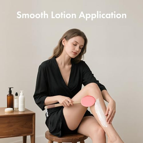 AmazerBath blush pink lotion applicator used for smooth application on the lower leg.