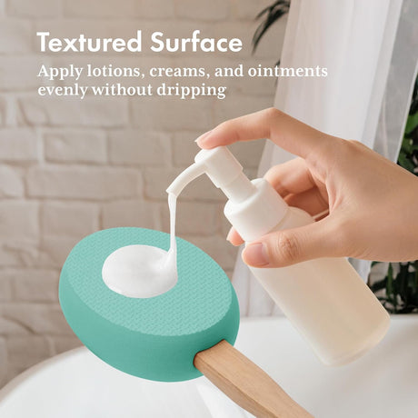 Lotion dispensed onto the textured mint EVA pad of the AmazerBath back applicator.