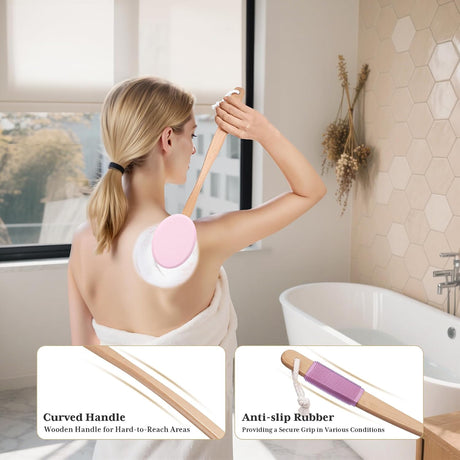 AmazerBath pink back lotion applicator used on the upper back with a curved wooden handle and anti-slip grip.