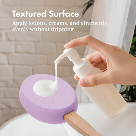 Lotion dispensed onto the textured purple EVA pad of the AmazerBath back applicator.