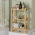 AmazerBath natural bamboo three-tier toilet rack holding toiletries, towels and tissue boxes.