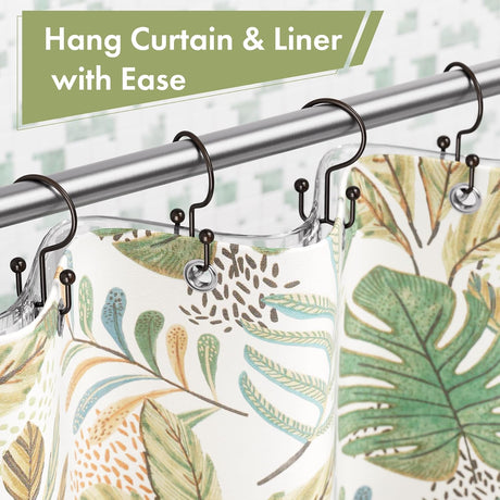 Bronze double shower curtain hooks hanging a decorative curtain and liner separately with ease.