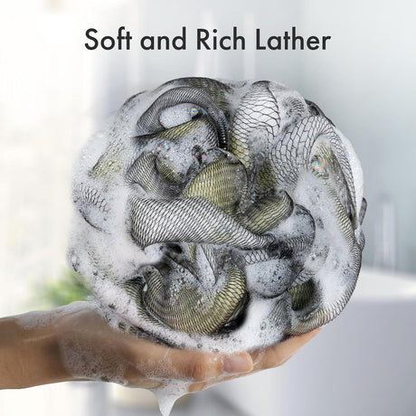 Dense, soft mesh on the Charcoal Exfoliating Loofah Sponges, Set of 4 in grey creating a rich lather.