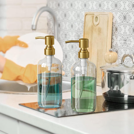 AmazerBath Clear Glass Soap Dispensers, 2-Pack in Clear Gold, product gallery view highlighting the design and finish.