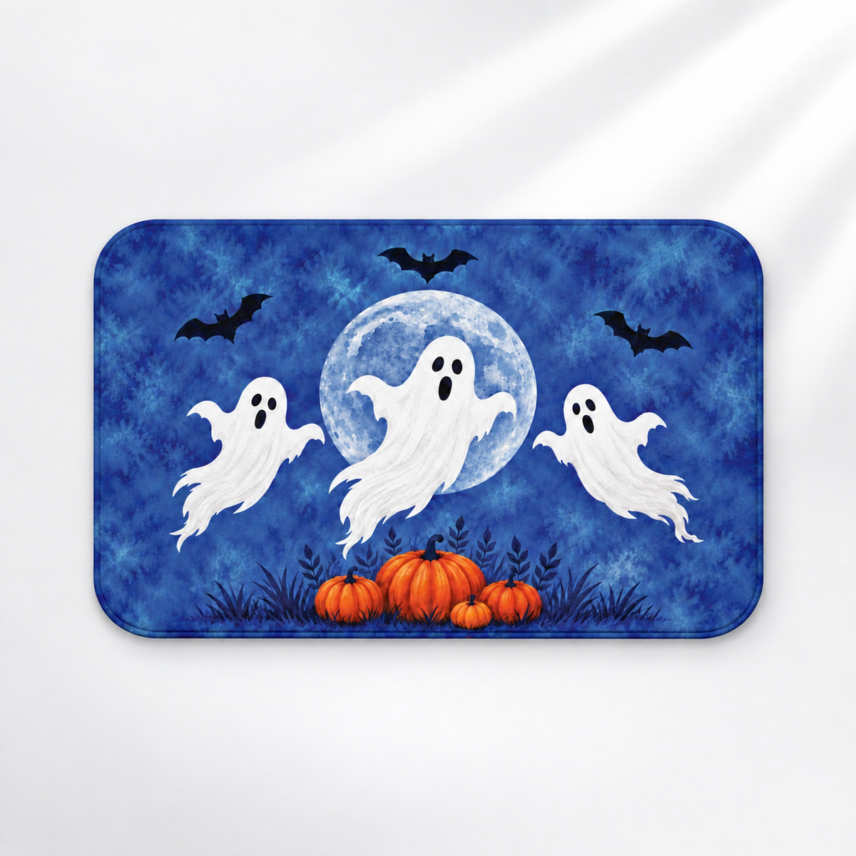 Moonlit ghosts Halloween bath mat with a blue moon and pumpkins on a light gray background