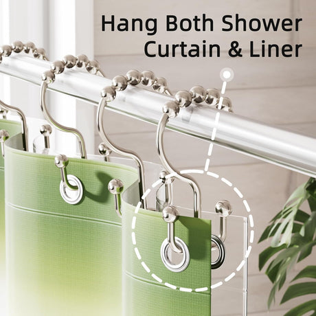Nickel double shower curtain hooks hanging both a decorative curtain and liner separately on one rod.