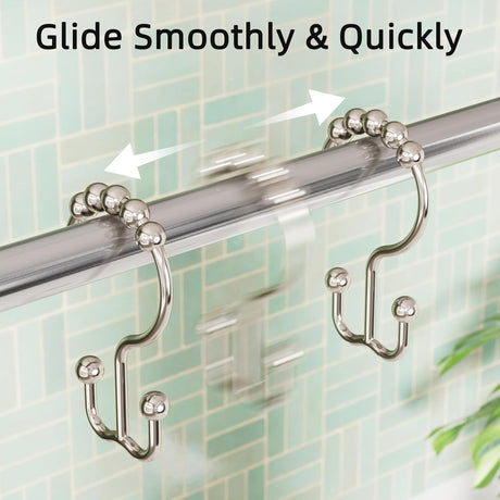 Nickel metal double shower curtain hooks with roller balls gliding smoothly along a bathroom shower rod.