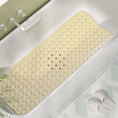 AmazerBath Beige non-slip bathtub mat in a bathtub
