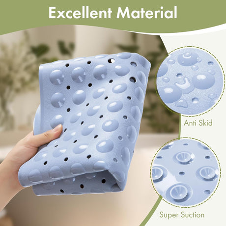 Folded blue AmazerBath bathtub mat showing its flexible surface and suction-cup underside.