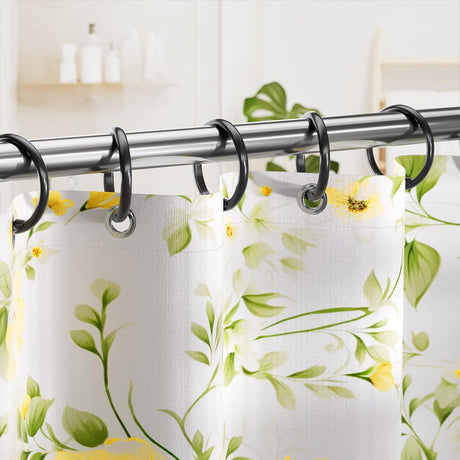 AmazerBath black plastic snap-closure rings hanging a patterned shower curtain on a metal rod.