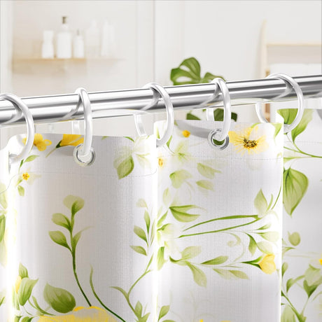 AmazerBath white plastic snap-closure rings hanging a patterned shower curtain on a metal rod.