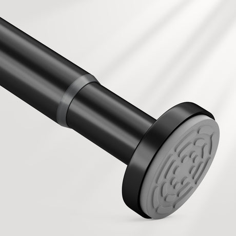 AmazerBath black segmented spring tension shower curtain rod installed in a bathroom for secure, tool-free support.