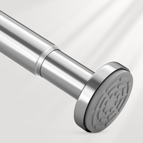 AmazerBath silver segmented spring tension shower curtain rod installed in a bathroom for secure, tool-free support.